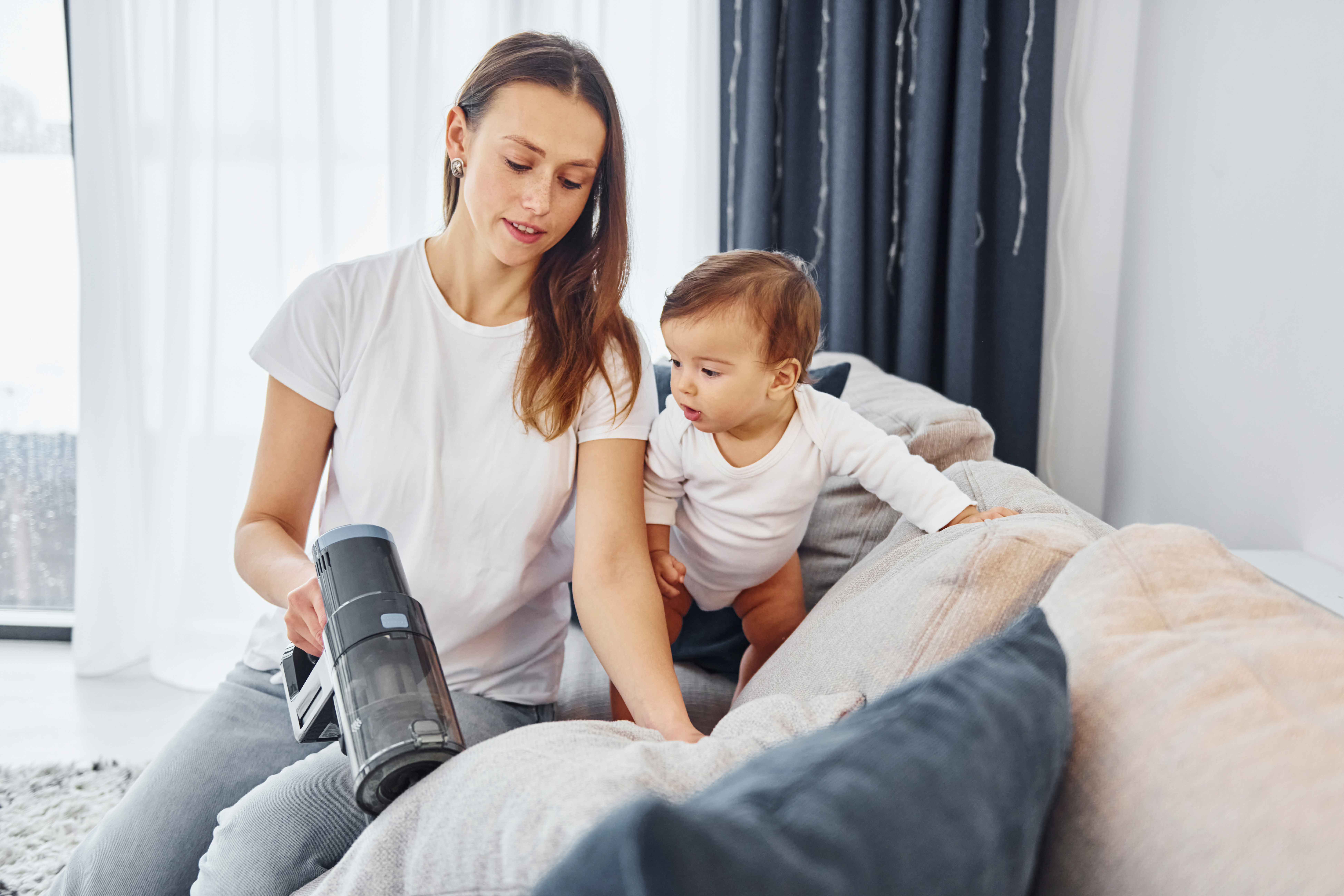 little-part-vacuum-cleaner-mother-with-her-little-daughter-is-indoors-home-together